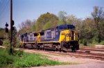 CSX 7673 has brought its train to a stop at Raleigh Street due to trackwork